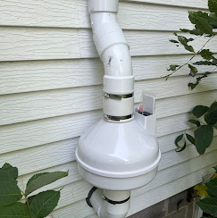 Radon system on house exterior